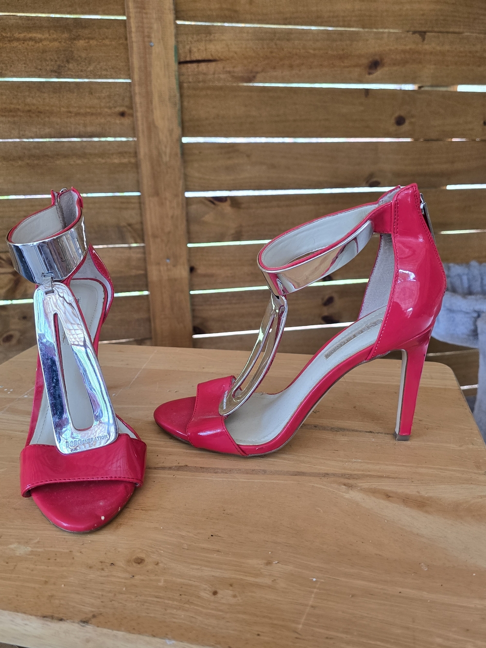 BCBGMaxAzria Hot Pink Patent T-Strap Stiletto Sandals with Silver Accent